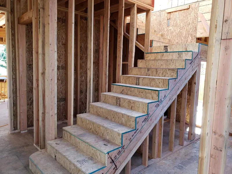 Framed staircase inside the new home