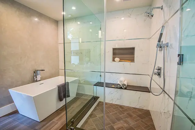 Bathroom with freestanding tub and glass shower