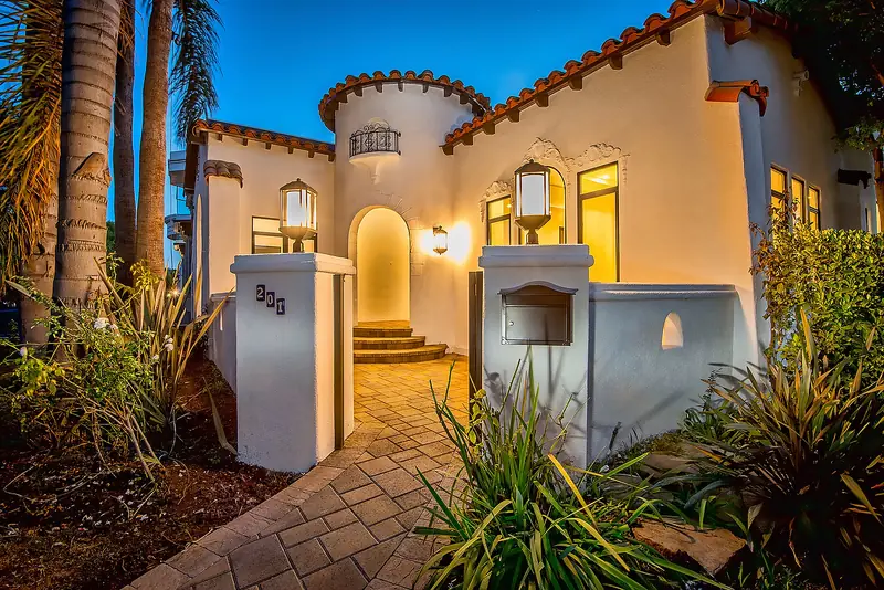 Tiled entry path and landscaped front yard